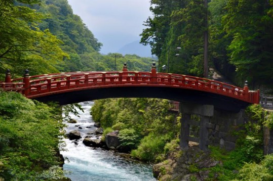 red bridge over stream